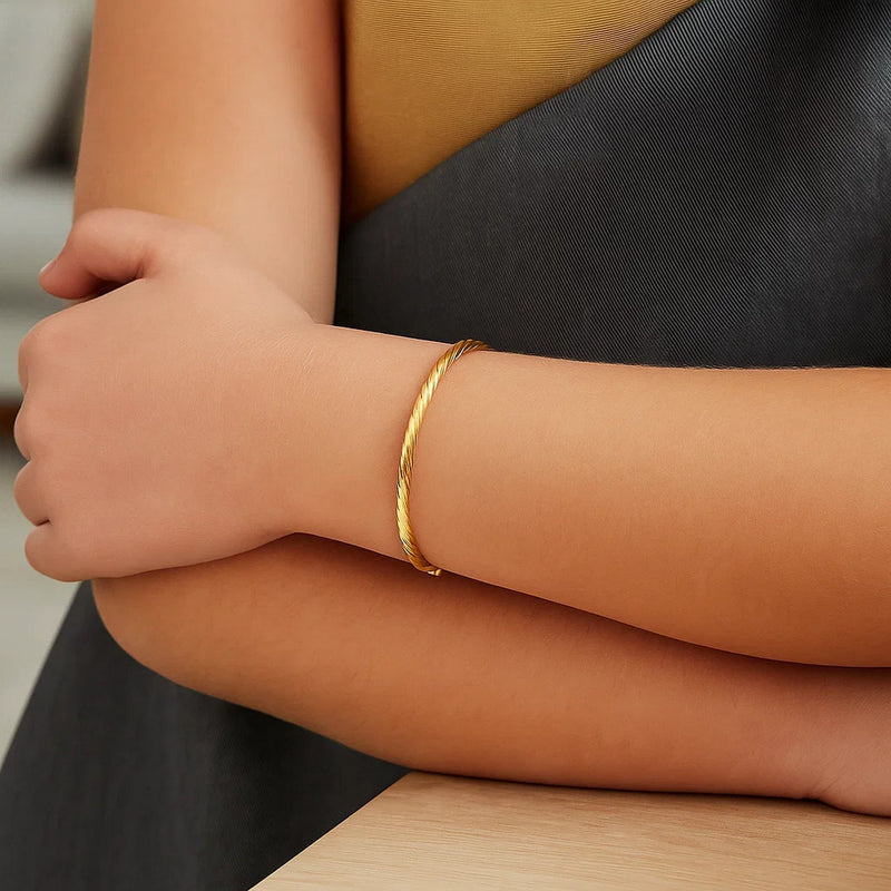 14k Yellow Gold Childrens Bangle with Spiral Motif Style (3.50 mm)