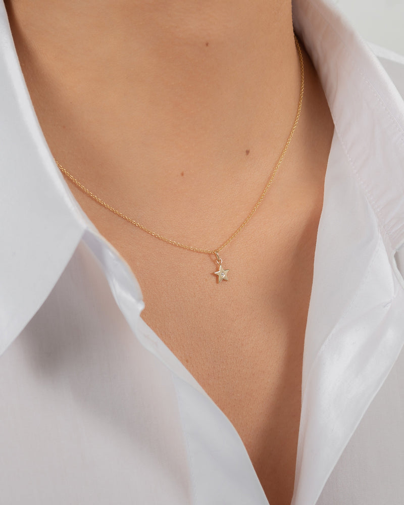 14k Gold Star with Tiny Diamond Pendant