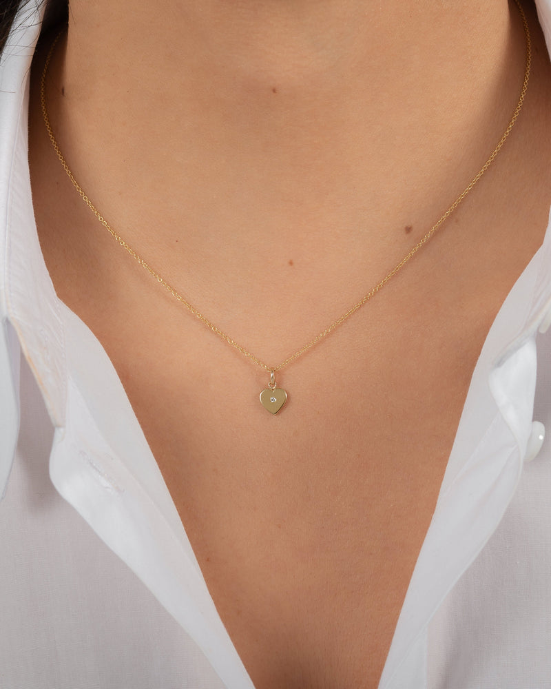 Gold necklace with a heart pendant