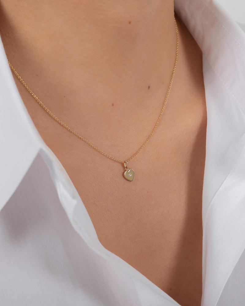 Gold necklace with a heart pendant
